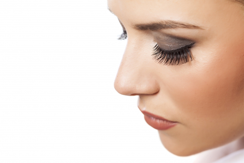 Close-up photo of a woman with long eyelashes.